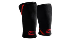 SBD Powerlifting Knee Sleeves 7mm – paar zwart-rode sleeves op witte achtergrond