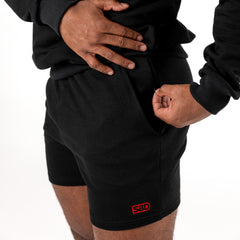 SBD Shorts Heren – zwarte short, detail van de taille en het logo