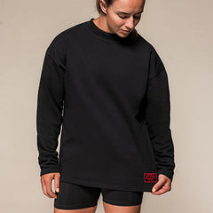 SBD Sweatshirt Classic – detail van de pasvorm en het rode label bij de zoom